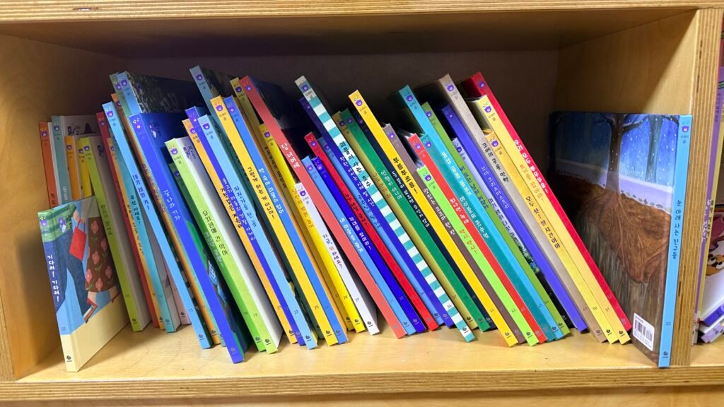 Doremi Bear Korean children's book sets on a bookshelf