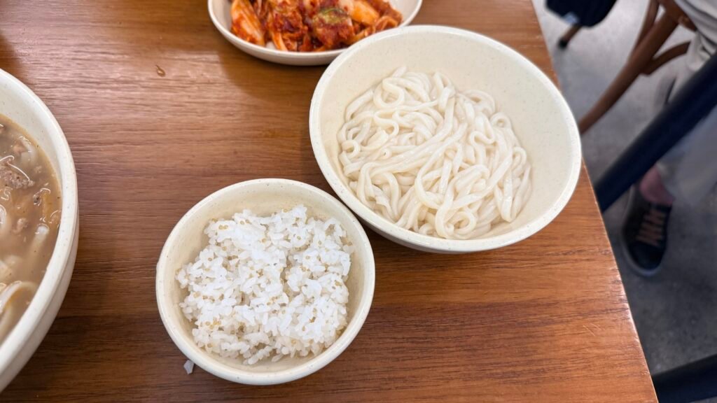 Free noodle and rice refills at Myeongdong Kyoja