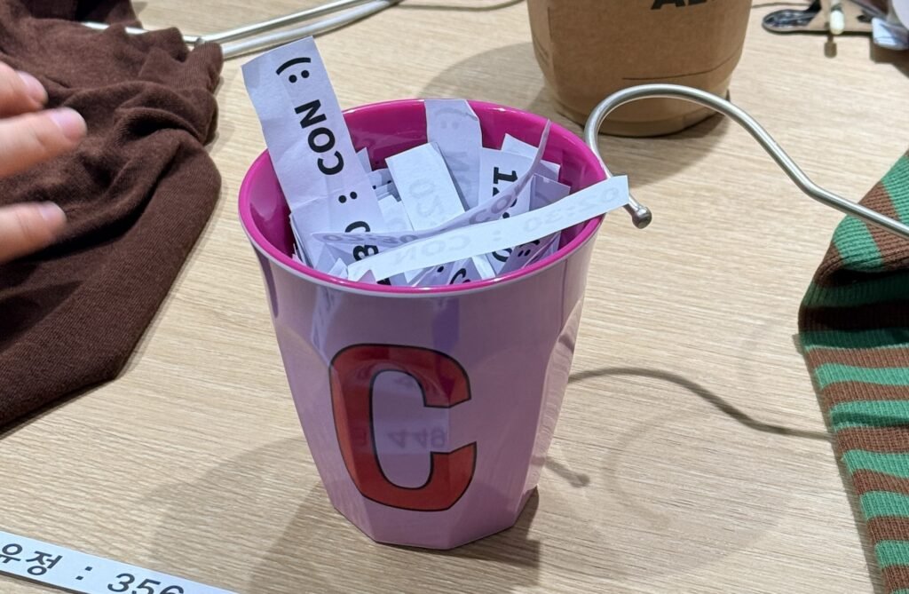 Numbered entry tickets at CON children's clothing store in Namdaemun