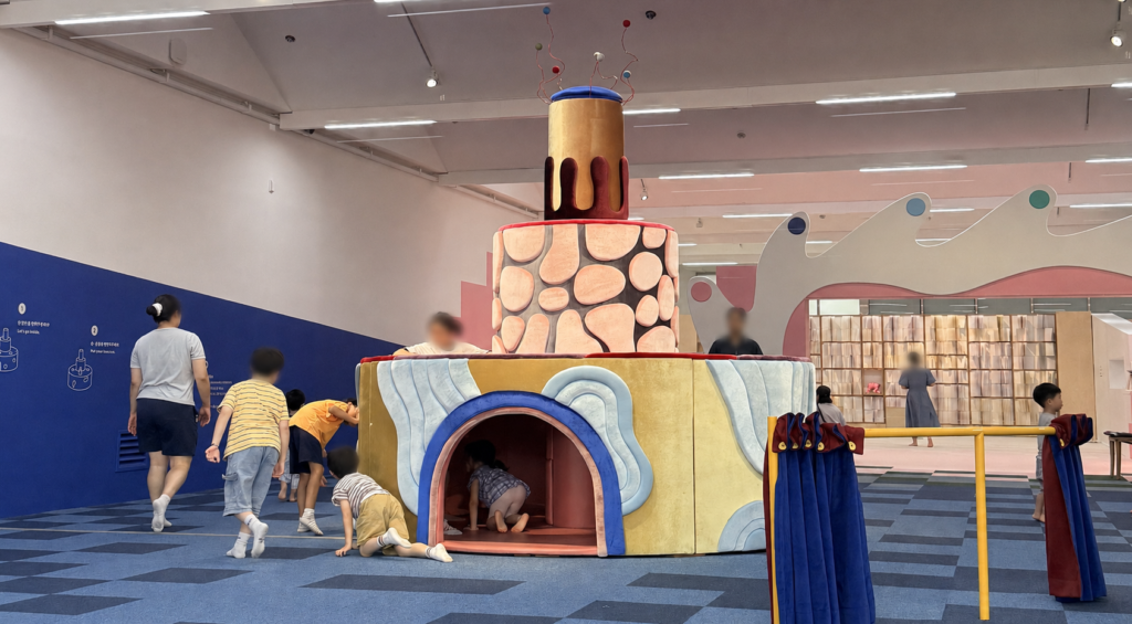 Children exploring KKEKK's soft textile installation at MMCA Gwacheon