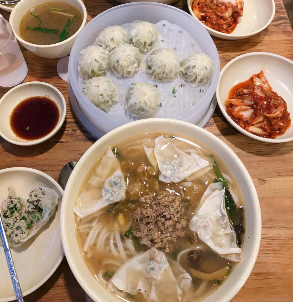 Kalguksu with mandu and garlic kimchi at Myeongdong Kyoja