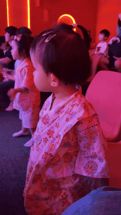 Toddler watching the Pororo show at Pororo Theme Park Dasan