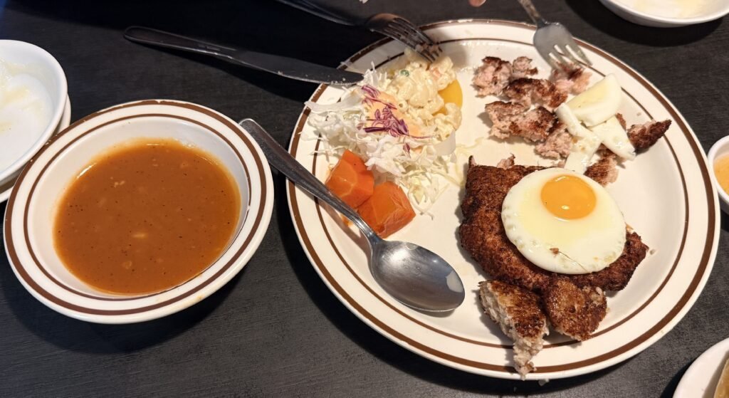 Hamburger steak with sauce served separately at a toddler-friendly restaurant in Jamsil