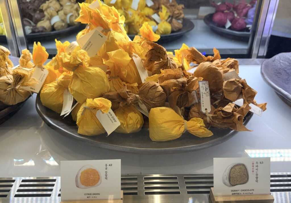 Hanjeongseon mochi flavors displayed in the showcase