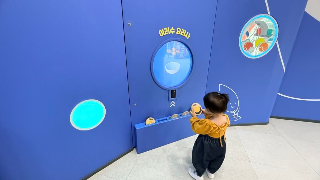 Toddler walking inside Arisu Nara at Seoul Children's Grand Park