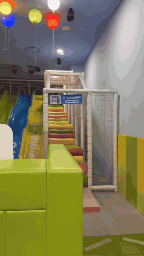 Play area with a giant slide at Pororo Theme Park Dasan
