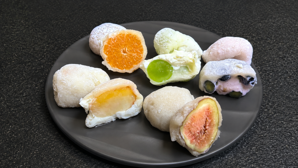 Five Hanjeongseon mochi flavors cut in half to show the fillings